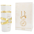 Yara White Perfume by ALBASHA Store, featuring an elegant bottle design with gold accents, accompanied by a decorative box. This 50ml fragrance is known for its fresh and floral scent, ideal for women seeking sophistication.