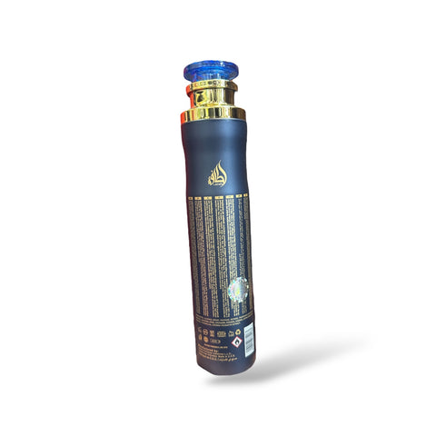 a blue bottle with a gold top on a white background