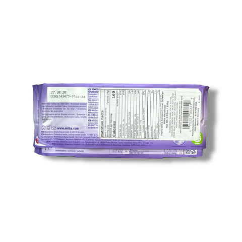 Back view of Milka Hazelnut Chocolate with Broken Hazelnuts packaging displaying nutritional information, produced by Milka and available at ALBASHA Store.