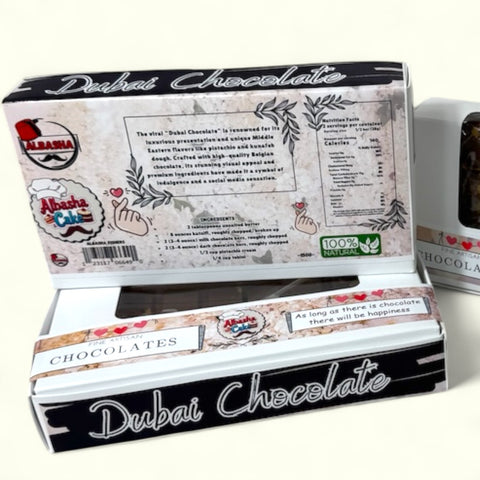 The bottom view of the Dubai Chocolate package from ALBASHA, emphasizing its gourmet qualities with intricate ingredient details and nutritional facts.