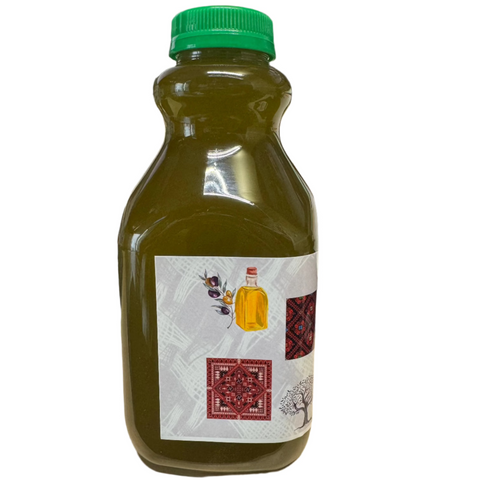 A close-up of the Premium Extra Virgin Palestinian Olive Oil 1L from ALBASHA, featuring traditional motifs on the label. This olive oil is celebrated for its rich flavor and health benefits.