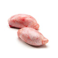 two raw chicken breasts on a white background