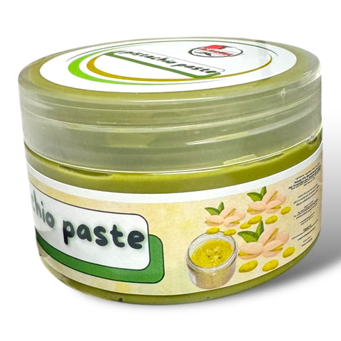 a close up of a jar of paste on a white background