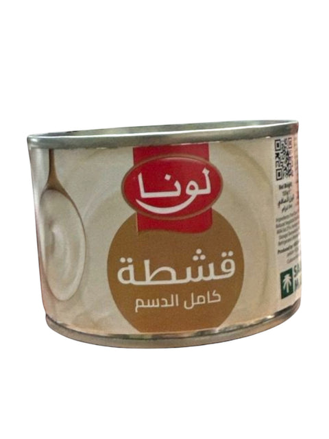 a can of food with a spoon in it