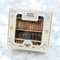 A front view of a packaged assortment of sweet butter cookies from Albasha, beautifully arranged for gift-giving. These fresh baked cookies are ideal for expressing love during Valentine's, showcasing a range of delightful flavors. Butter cookies, Cookies.