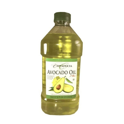 A bottle of Cappadocia Avocado Oil Plus, showcasing its vibrant green liquid and the label that displays the product name and details. The bottle has a sturdy top and is designed for kitchen use, emphasizing its culinary applications.