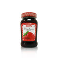 Jar of Tunas Strawberry Preserve, 28.2 oz, featuring a red label with strawberry images and decorative borders, set against a white background.