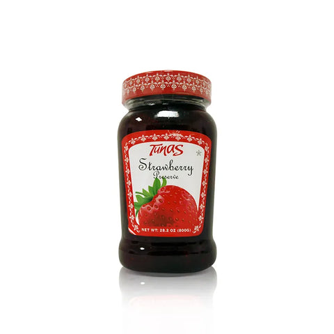 Jar of Tunas Strawberry Preserve, 28.2 oz, featuring a red label with strawberry images and decorative borders, set against a white background.